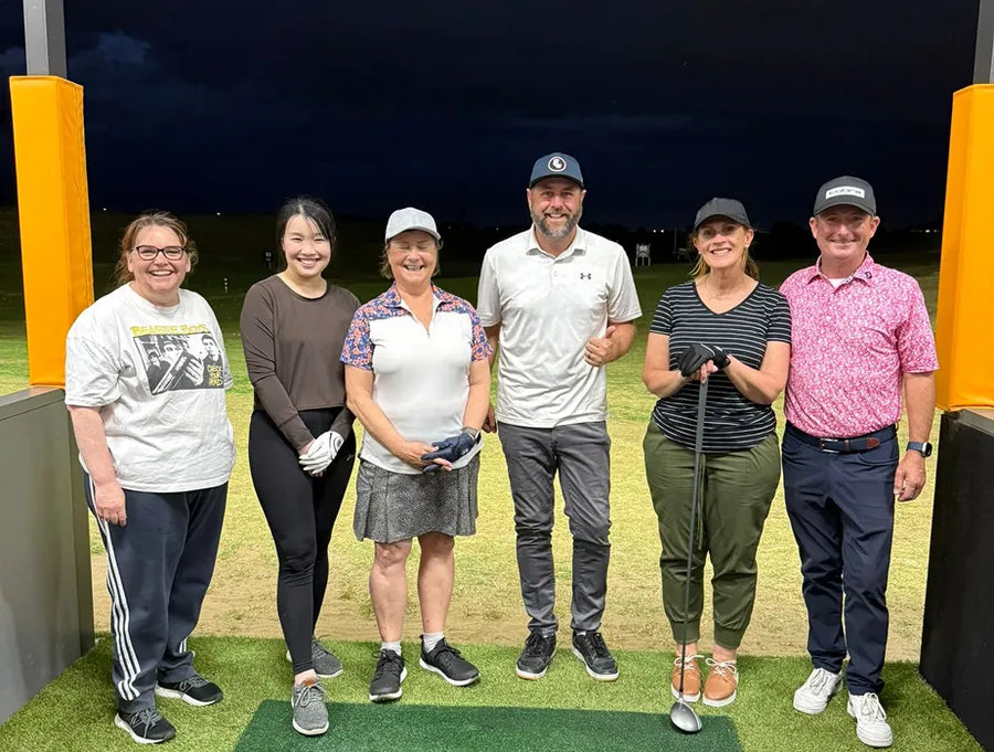 Group enjoying golf at Sanctuary Lakes